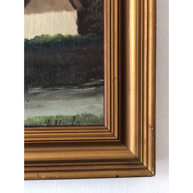A vintage original oil painting of a countryside scene, dating from 1960. The painting shows cottages, greenery, and a...