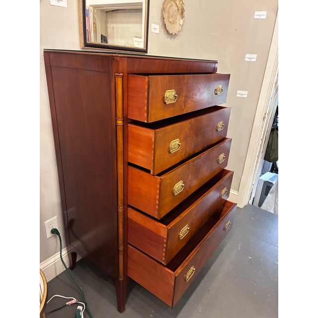 This is a 1940s Crotch Mahogany Gentlemen's Chest by Berkey and Gay Furniture. It has five shelves with top shelf...