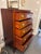 This is a 1940s Crotch Mahogany Gentlemen's Chest by Berkey and Gay Furniture. It has five shelves with top shelf...