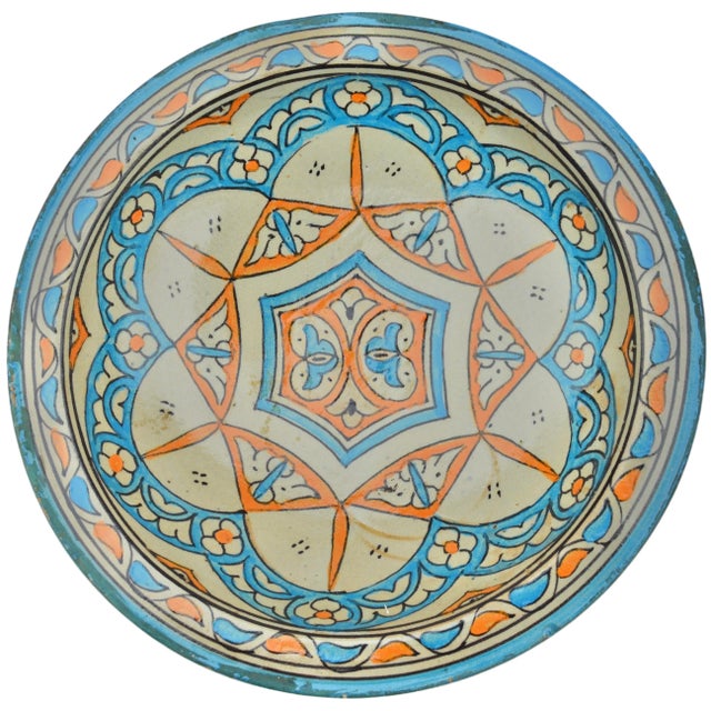 One-of-a-kind antique handcrafted and glazed Moroccan ceramic plate from Fez. Featuring an elaborate hand-painted colorful...