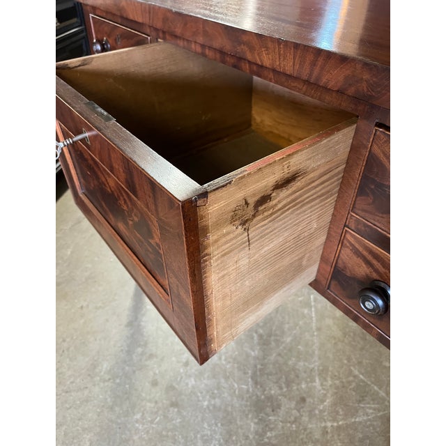 Early 19th Century English Regency Flame Mahogany Brandy Board An early 19th century English Regency brandy board in...