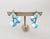 Trifari Vintage 1950s Signed Crown Trifari White & Turquoise Checked Drop Clip Earrings-2 Pieces For Sale - Image 4 of 10