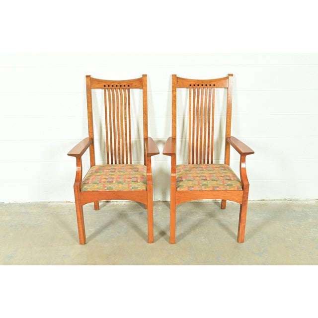 An exceptional pair of Mission or Arts & Crafts style high back spindle armchairs or dining captain chairs By L. & J.G....