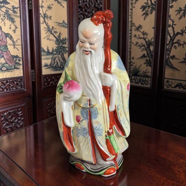 The Vintage Immortal Chinese Shou Xing Longevity Mythological God Hand Painted Figurine is a handmade collectible piece...