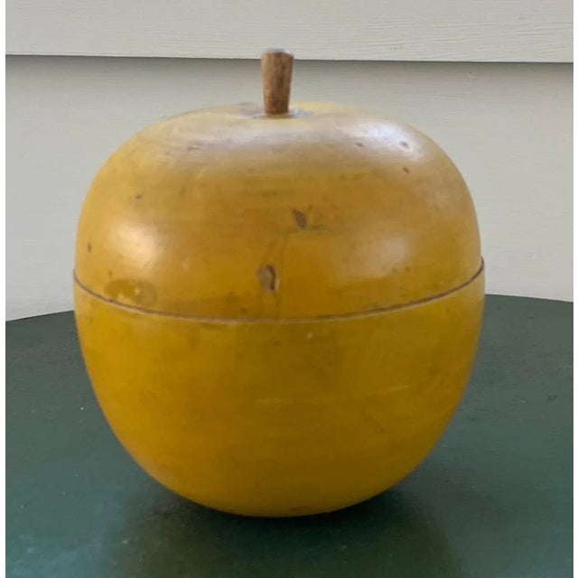 Antique early 20th century paint decorated carved wood apple box. Beautiful bright color. Measures 4 3/4" tall. This apple...