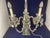 Up for sale a pair of vintage Regency style electrified heavy cut crystal candelabrum circa 1930s - 1950s. The candelabrum...