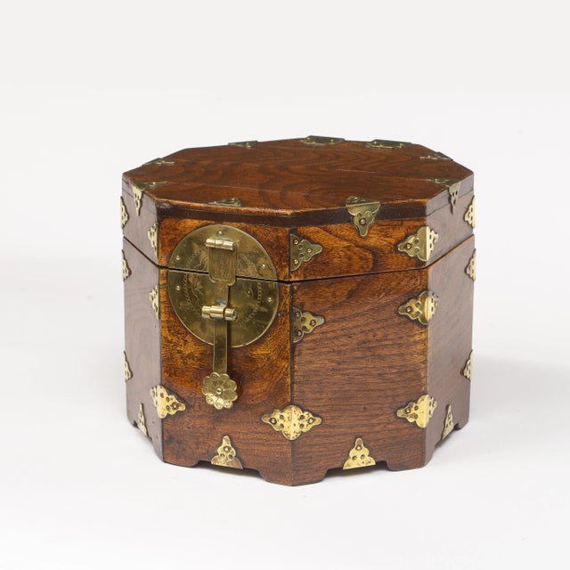 Brass bound octagonal Chinese Box Made out of Jumu wood (Southern Elm) Interior covered in Chinese paper