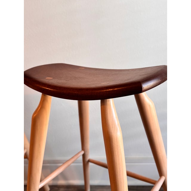 "This is an exceptional set of three authentic bar stools handcrafted by renowned designer Stephen Swift in 1996. These...