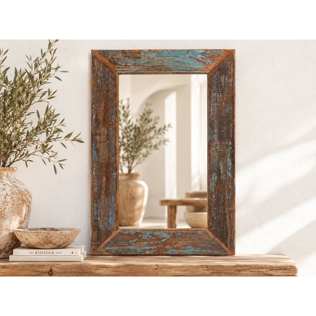 This rustic reclaimed mirror frame offers a perfect fusion of rustic charm and contemporary aesthetics. Crafted from...