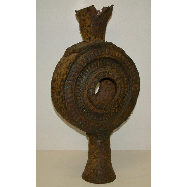 A monumental Jack Hooker slab built stoneware vase with a matte glaze. This sculptural vase was used in a Schumacher wall...