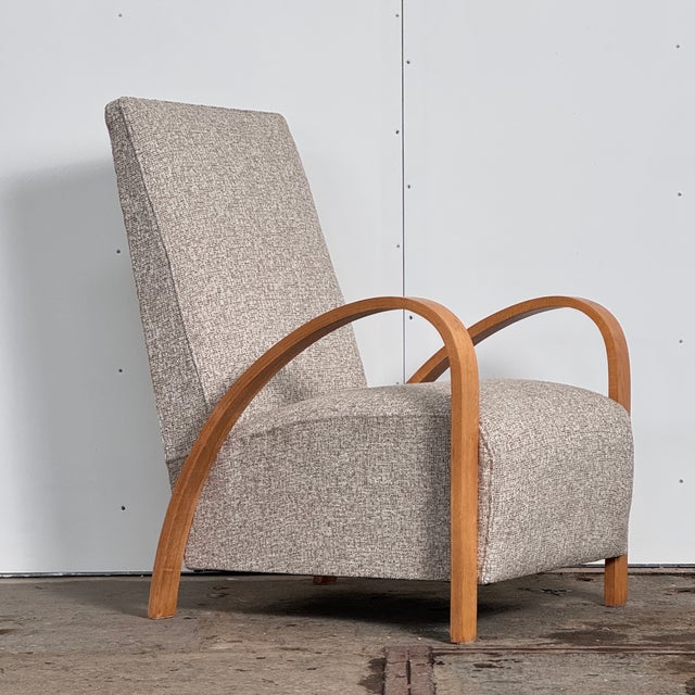 Striking French Art Deco armchair from the 1930s with an extra-high backrest. Fully refurbished and structurally sound,...