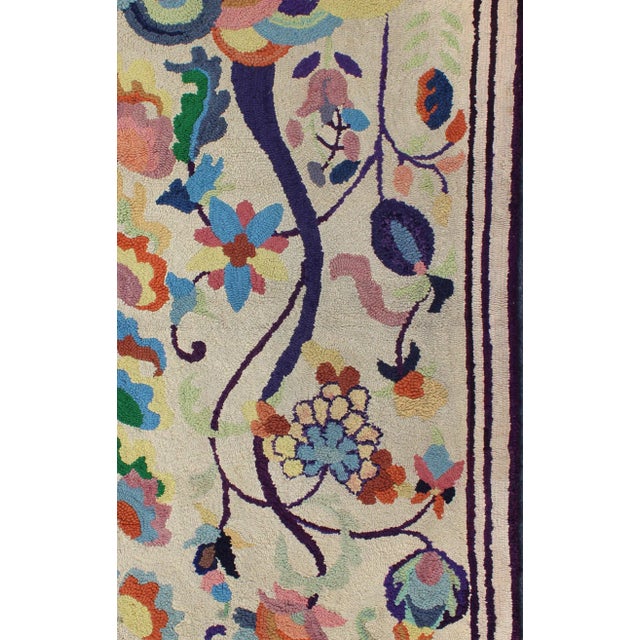 Colorful vintage American hooked rug with branching rainbow-colored flowers, Keivan Woven Arts / rug L11-0902, country of...