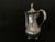 A gorgeous, matching two-piece vintage silver-plated beverage service set from Wm. A. Rogers (Canada). Both pieces feature...