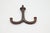 Vintage ceiling mount double arm hook made of cast iron with a black finish and screw top. Good condition with surface...