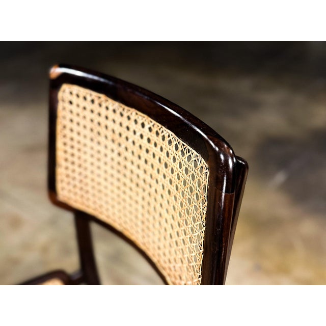 This exceptional pair of chairs, designed by Joaquim Tenreiro in the 1960s, represents one of the most refined expressions...