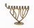 Collection of Three Judaica Brass Candelabra, comprising: a Hebrew character form menorah, a Lion of Judah motif menorah...
