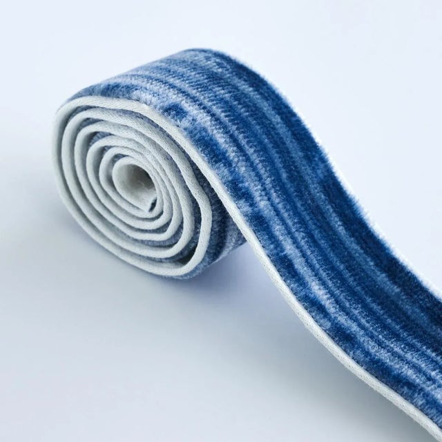 Gaspard Velvet Tape Narrow is a luxurious velvet tape, with its soft and silky pile, irregular tonal stripes and narrow...