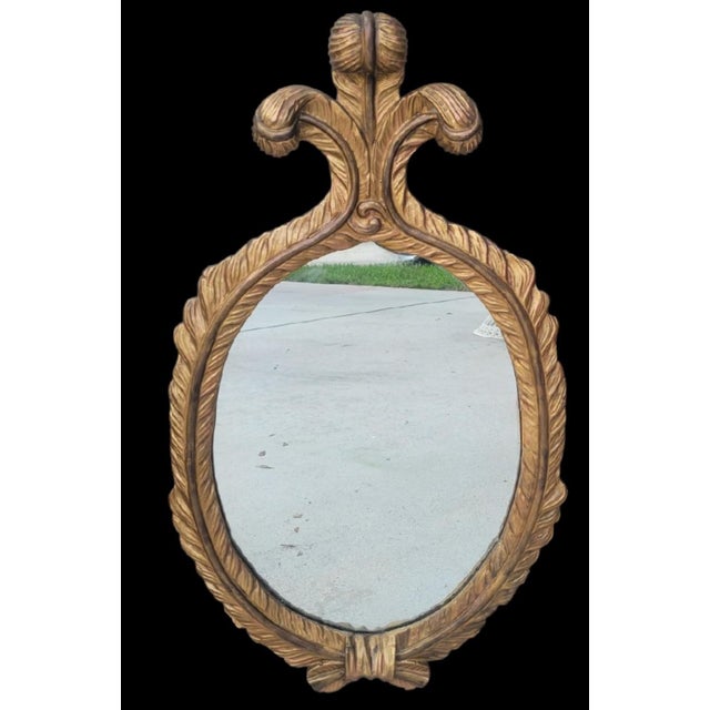 ​Elevate your interior with this showstopping vintage gold gilt wall mirror by renowned maker John-Richard. ​Exuding...