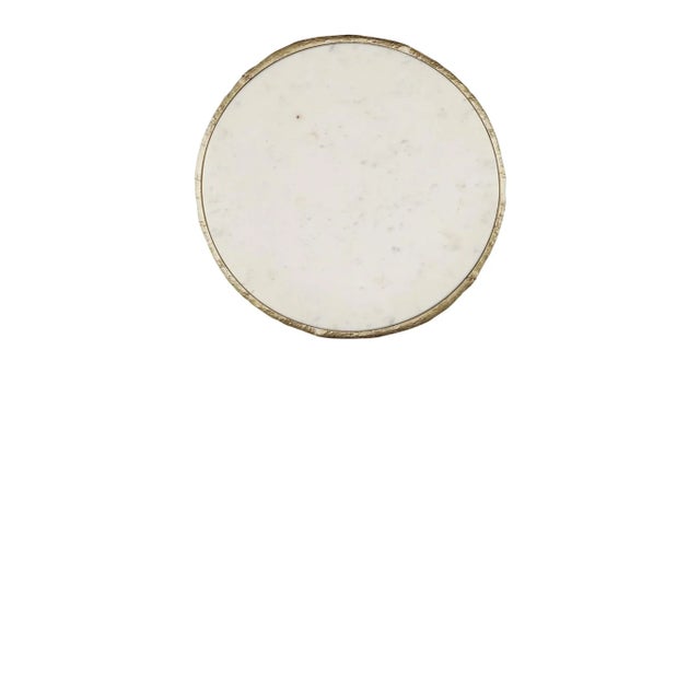 White/grey marble top on antique brass base Assembly Required? No Care Instructions: Dust with a soft, clean cloth...