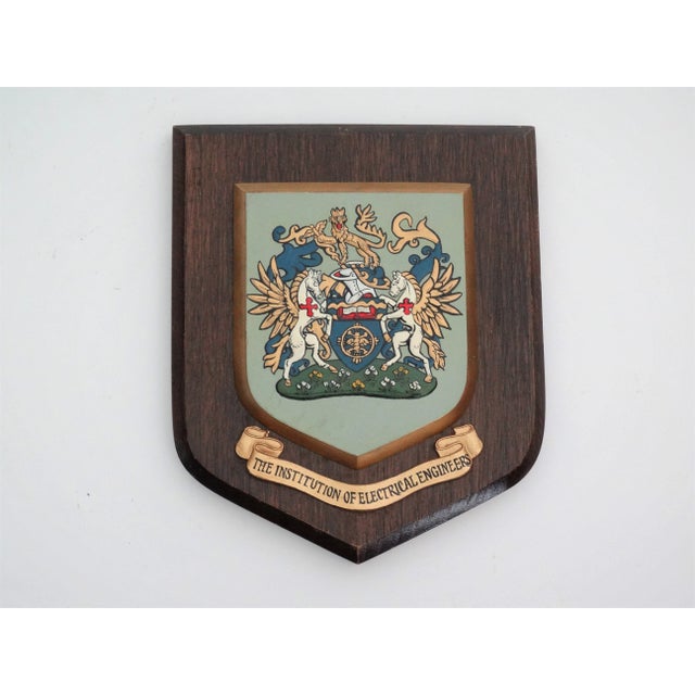 Circa 1950, an Institution of Electrical Engineers, United Kingdom crested wall plaque. The coat of arms is slightly...