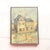 20th Century French Yellow House Painting features a softly rendered architectural scene centered around a pale yellow...