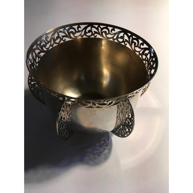 London early 20th century sterling silver bowl by Goldsmiths & Silversmiths This elegant bowl has a finely floral carved...