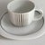 Coffee cup and saucer set Series: Suomi Decoration: Linja Material: Porcelain Design: Timo Sarpaneva Cups from 1979,...