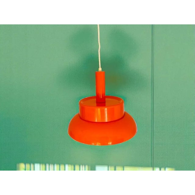 This lamp is an excellent example of Mid Century Modern design. It was made in the 1960s in Portugal, in a typical for...