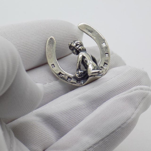 Vintage miniature sculpture with a symbolic and delicately decorative charm, depicting a lucky horseshoe with a cherub,...