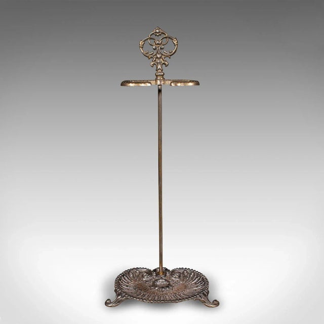 This is an antique Art Nouveau stick stand. A French, cast metal hallway umbrella rack, dating to the late Victorian...