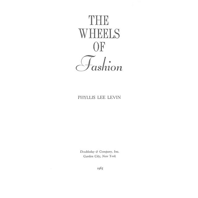 LEVIN, Phyllis Lee [244] pp. Doubleday & Company, Inc 1965 First Edition 9 1/2" x 6 1/2" Jacket gown by Trigere The Wheels...