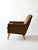 Vintage Scandinavian armchair of Swedish origin. The seat, which includes the armrests, is lined with original period...