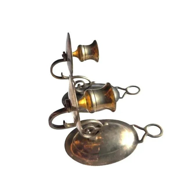 A pair brass candle sconces for the wall Kinda dainty with some scrollwork