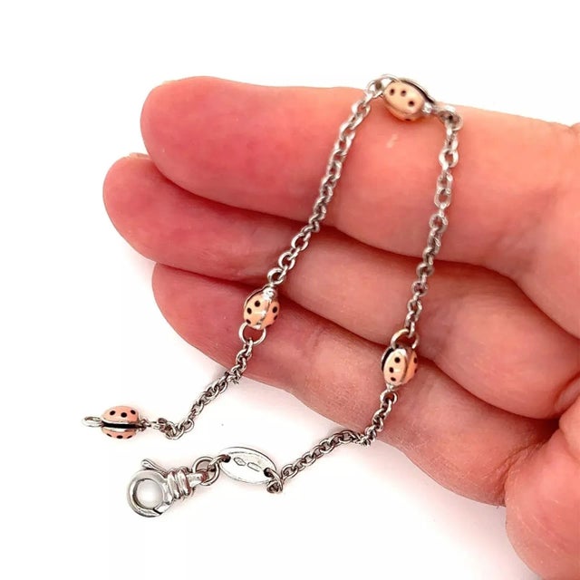 Charming and authentic from designer Aaron Basha, this adorable bracelet is crafted from 18k white gold with a polished...