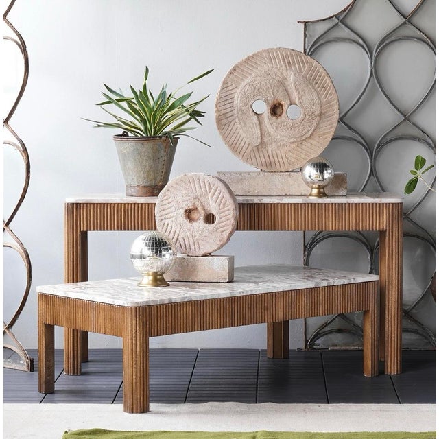 Mango wood slats atop a solid frame. The wood is finished with plastic paint, providing a deep caramel hue. The textured...