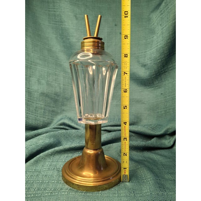 This exceptional mid-19th-century fluid lamp features a heavy flint glass font in the classic "Flute" or "Panel" pattern....