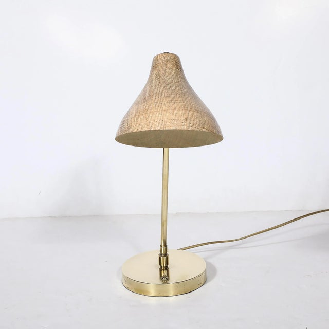 This minimal yet materially captivating Mid-Century Modernist Articulating Table Lamp in Striated Resin Shade & Polished...