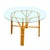 This beautifully restored round Frankl-inspired round rattan dining table features a sculptural 3-strand rattan base with...