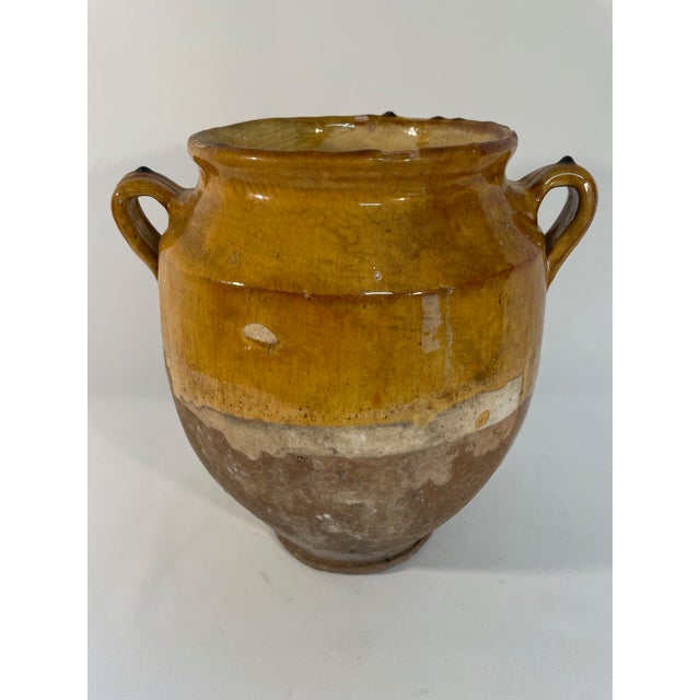 A charming French drip glazed Earthenware Confit Pot or Jar from the South of France. Circa 1890s. This lovely rustic pot...