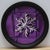 This artwork features a delicate paper snowflake, intricately rendered and positioned against a rich, deep purple...