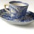 A charming complementary pairing of 18th-century Chinese export blue-and-white porcelain, comprising a small handled cup...
