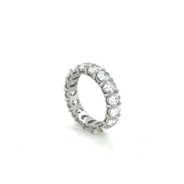 This gorgeous eternity band contains 17 oval brilliant cut diamonds weighing 5.00 carats total. Mounted in platinum and...