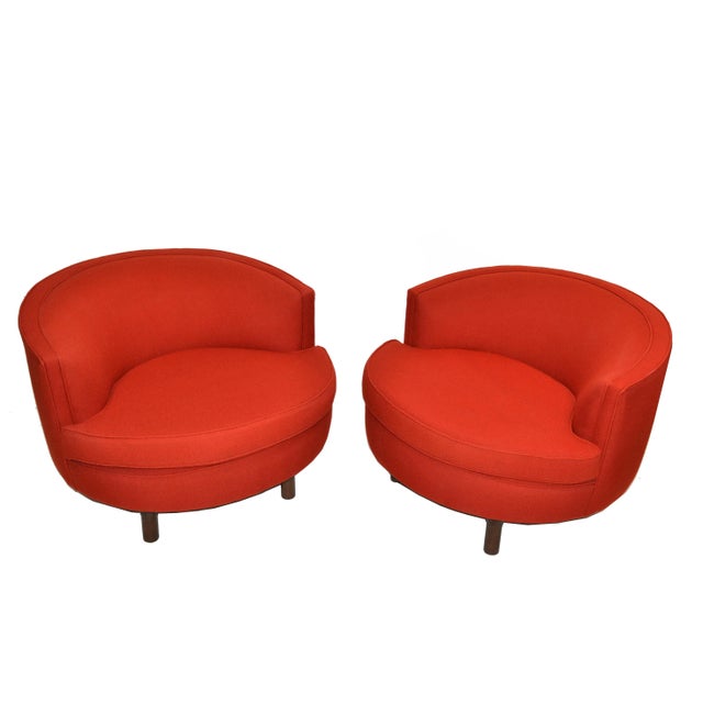 Pair of Milo Baughman Style Mid-Century Modern swivel tub lounge chairs on a four legs cross bar swivel base, in walnut...