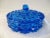 Gorgeous mid-century clear cut to clear glass lidded divided bowl in a stunning shade of lazer blue. When glass catches...