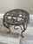 It is a very charming plant stand very likely from the 1940’s. It is charming small cast iron plant stand featuring an...