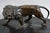 A complete 6 pieces continental desk garniture in veined black marble and bronze, centered by a naturalistically modeled...