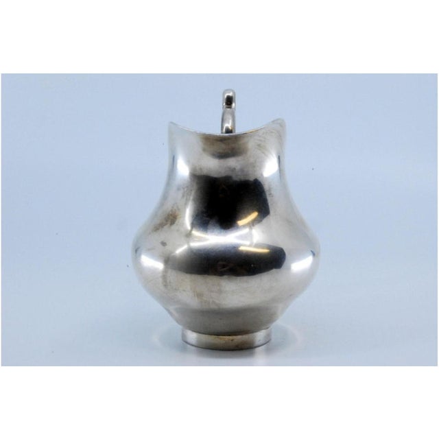 Rounded Silver Teapot with Embossed Handle For Sale - Image 4 of 11