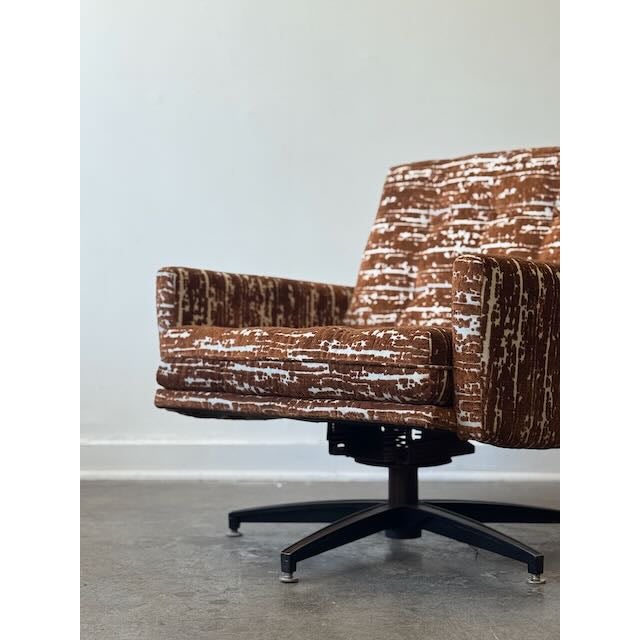 Groove into ultimate comfort with this authentic 1960s swivel lounge chair, now reupholstered to absolute perfection! The...