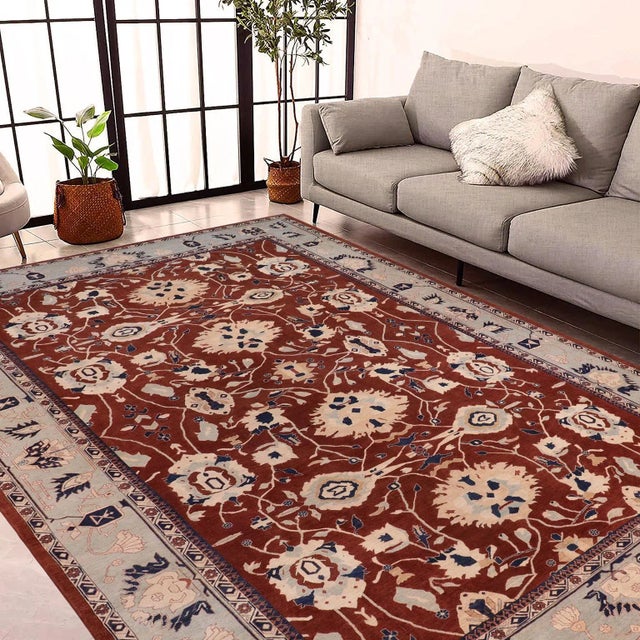 "Enhance the ambiance of your home with this magnificent Persian-influenced Turkish hand-knotted rug made by skilled...