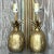 Brighten your space with a touch of coastal charm using this pair of Vintage petite Coastal Brass Pineapple Lamps. These...